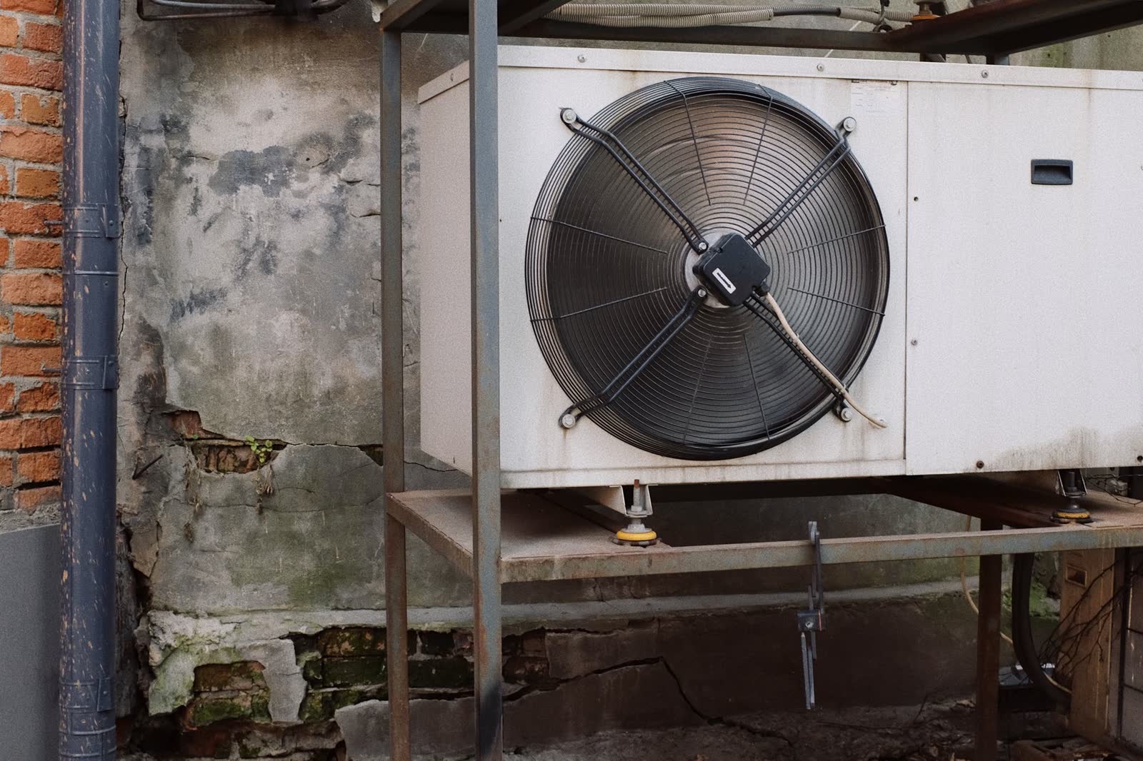 Outdoor condensing unit with a large fan on a steel stand