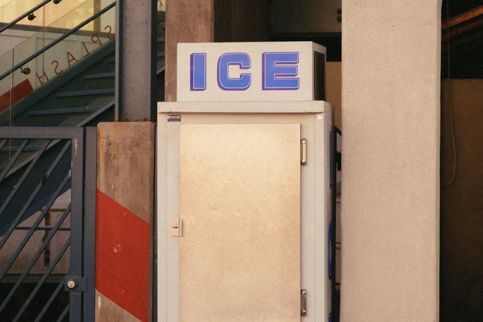 Outdoor ice merchandiser freezer with an ICE sign on top