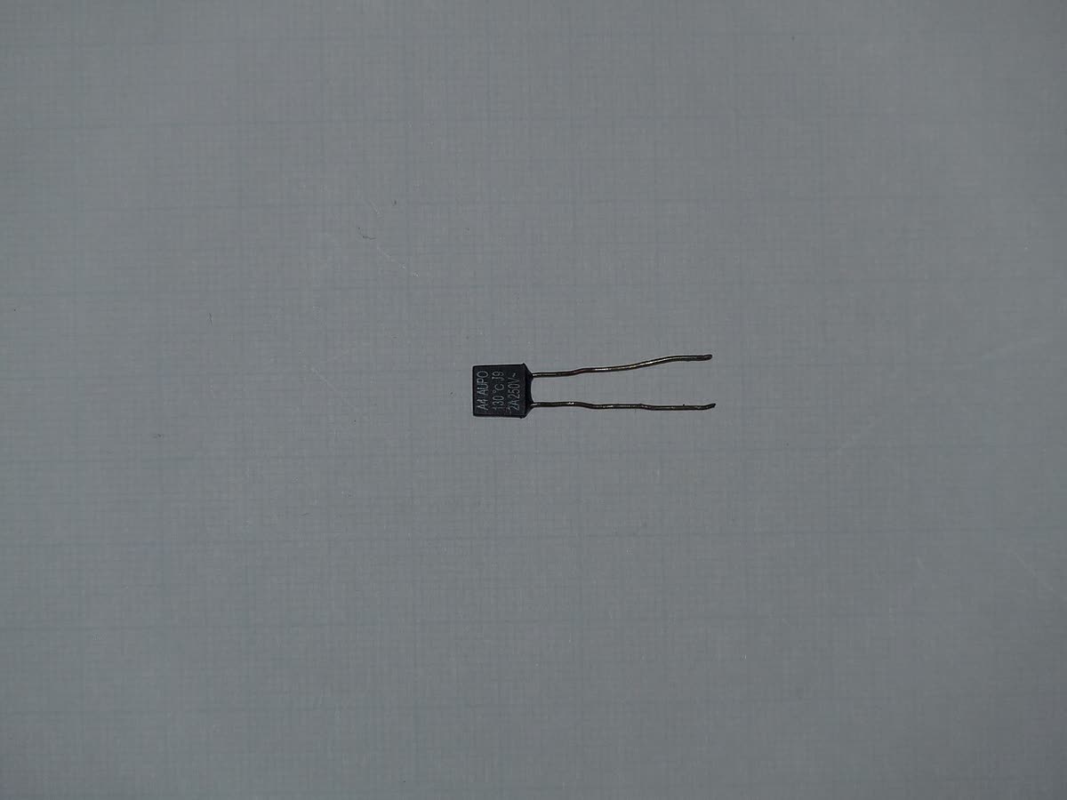 Axial thermal fuse, a one-time cutoff that opens when it overheats