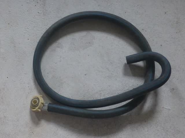 Washing machine drain hose with its hooked outlet end