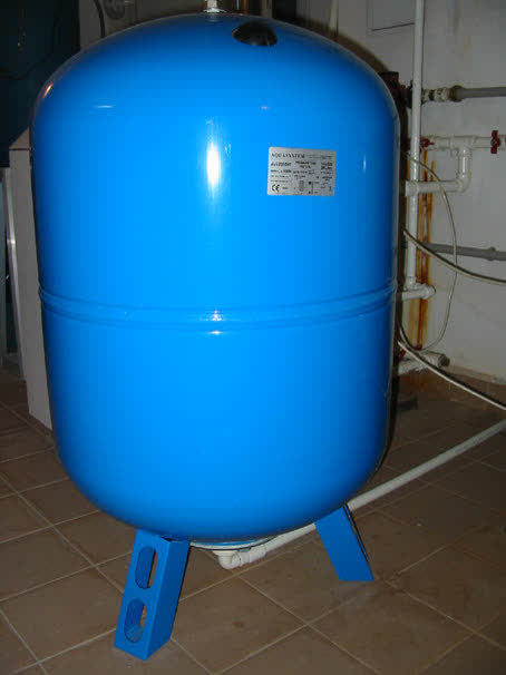 Blue diaphragm pressure tank on a domestic water system